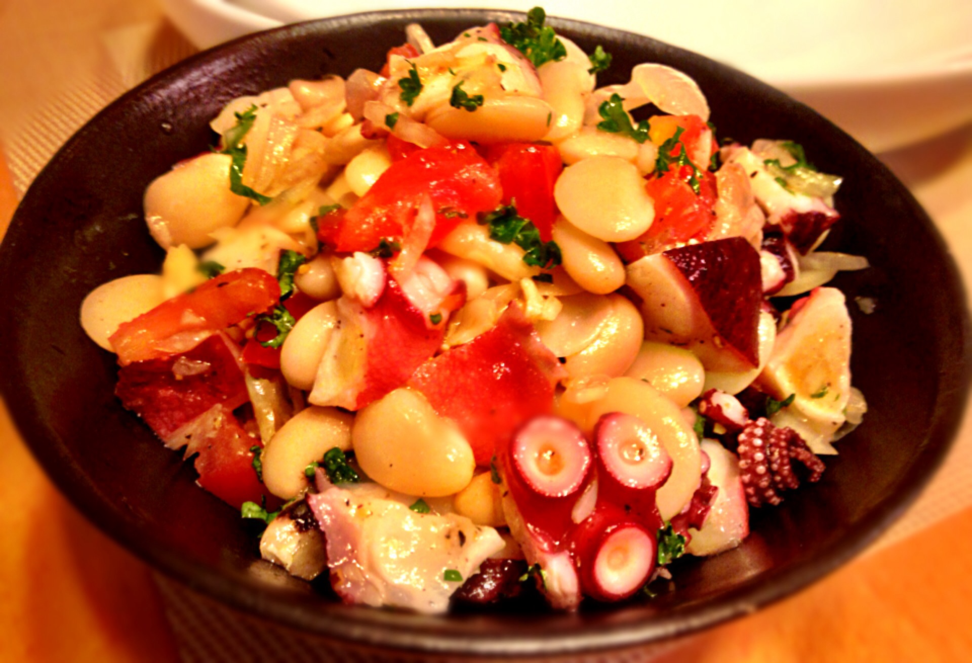 pan fried octopus served green bean salad