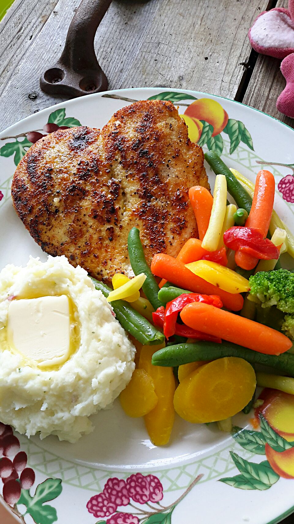 Pan seared chicken breast, garlic mashed potatoes, and heirloom veggies tossed in butter and lemon...