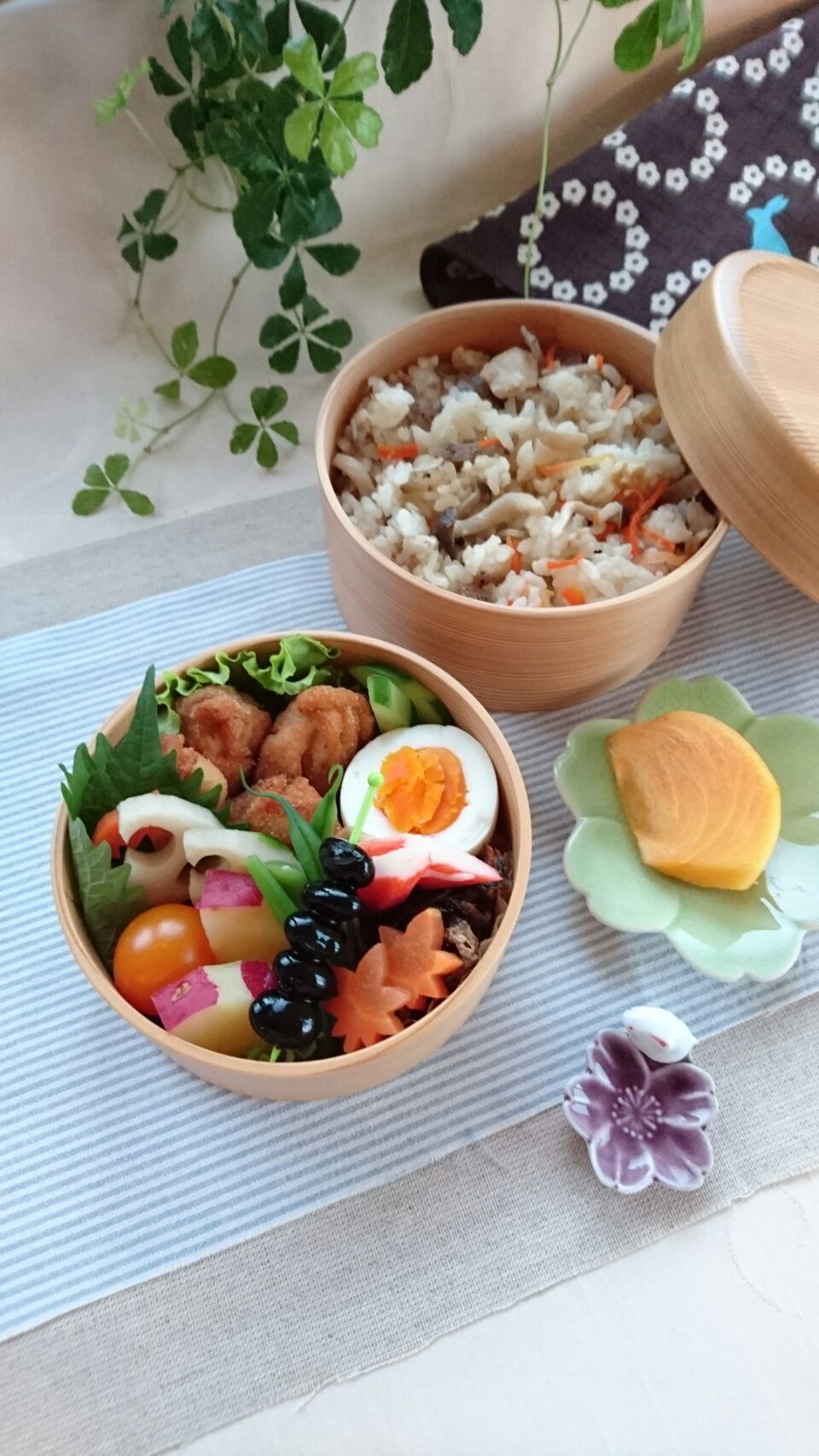 かやくご飯弁当 かやくご飯ゆで玉子唐揚げひじきの煮物カニかまれんこん にんじん いんげんの煮物黒豆さつまいものレモン煮プチトマトきゅうり柿 かやくご飯からあげわっぱ弁当曲げわっぱ女の子のお弁当中学生のお弁当女子弁当娘弁当娘のお弁当二段弁 E Sato Snapdish