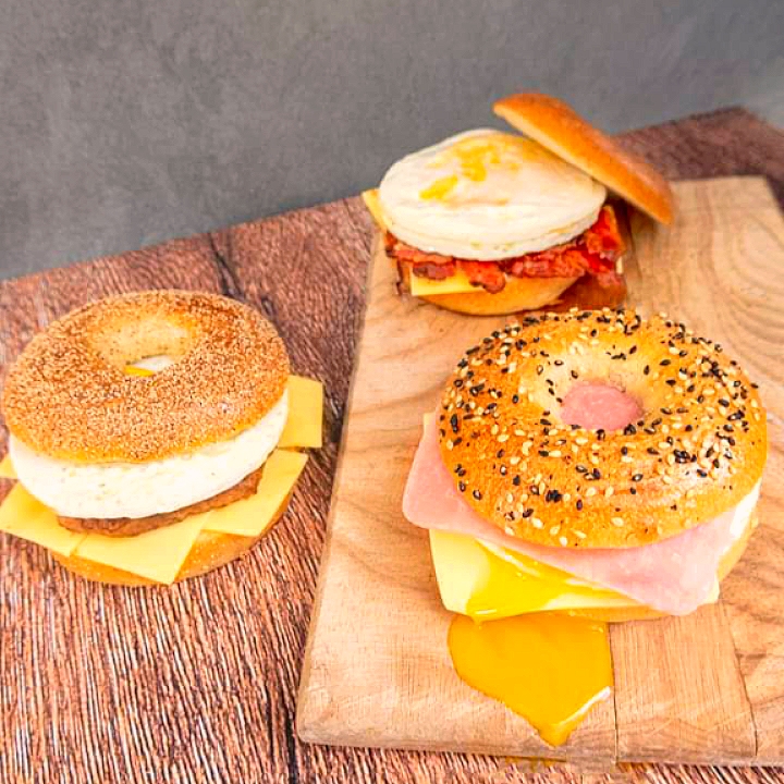 bagel with ham cheese bacon and egg
